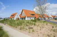 Moderne bungalows op Breeduyn Village aan de Vlaamse kust