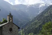 Kijk vanaf het park op de bekende Alpe d’Huez. 
