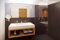 Badkamer in 1 van de appartementen