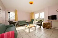 De woonkamer in 1 van de bun