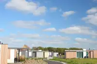 Vrisjtaande lodges op Roompot Vakantiepark Callassande